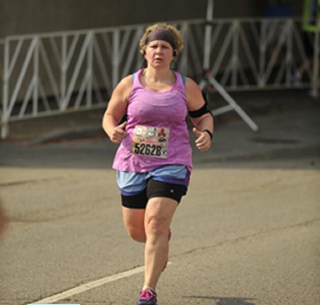 April Grimes running in event